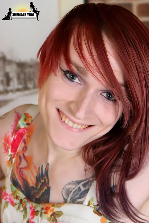 Redhead Trans Woman Lifts Her Skirt for Anal Play – photo 2 of 16