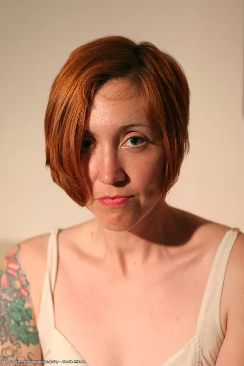Short-Haired Redhead MILF Spreads Her Hairy Pussy – photo 1 of 21