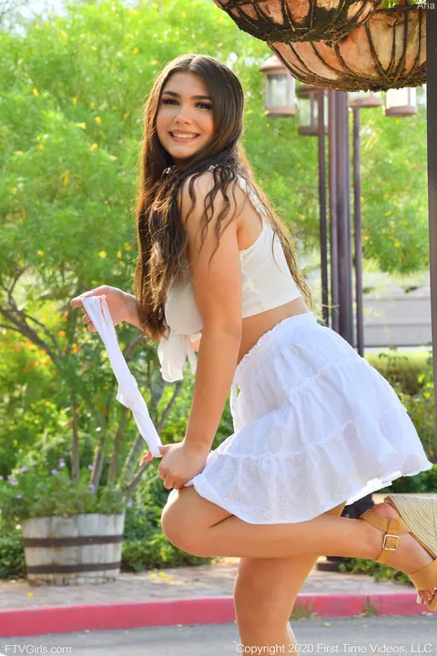 Aria Taylor: Busty Brunette Flashes Her Panties Under Her Skirt in Public – photo 16 of 20