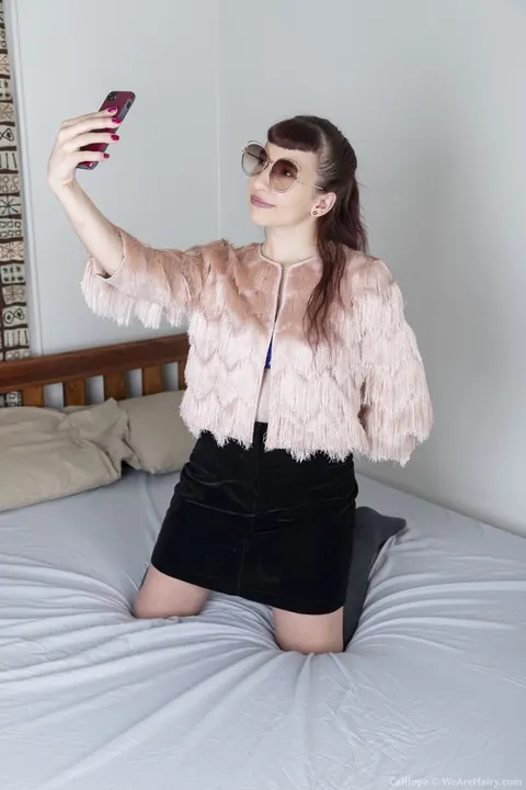 Woman in a Skirt Pulls Panties Aside and Fingers Herself – photo 1 of 20