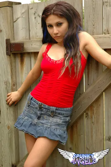 Slim Brazilian Latina in a Skirt Flashes Her Thong Outdoors