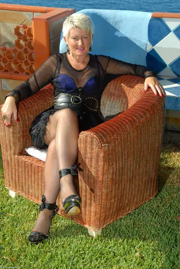 Mature Blonde MILF Strips Out of Her Lingerie Outdoors
