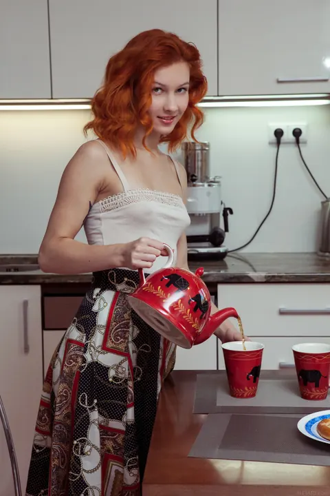Slim Curly Woman Spreads Her Pussy in the Kitchen – photo 1 of 21