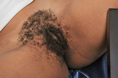 Tess Morgan: Tanned Latina Strips Nude Showing Her Hairy Pussy – photo 7 of 21