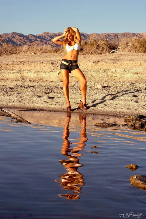 Kayden Kross: Slim Blonde Centerfold Strips and Squats Naked on the Sand – photo 2 of 17