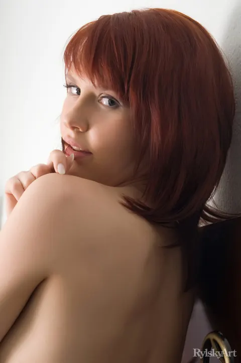 Pale European Redhead Undresses on the Window Sill – photo 13 of 16
