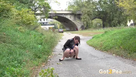 Amanda Hill: Tattooed Tall Brunette Pulls Down Her Shorts and Pees on Public Path – photo 3 of 15