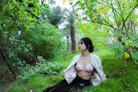 Asian Brunette with Short Hair Poses Outdoors in Revealing Clothes – photo 17 of 20