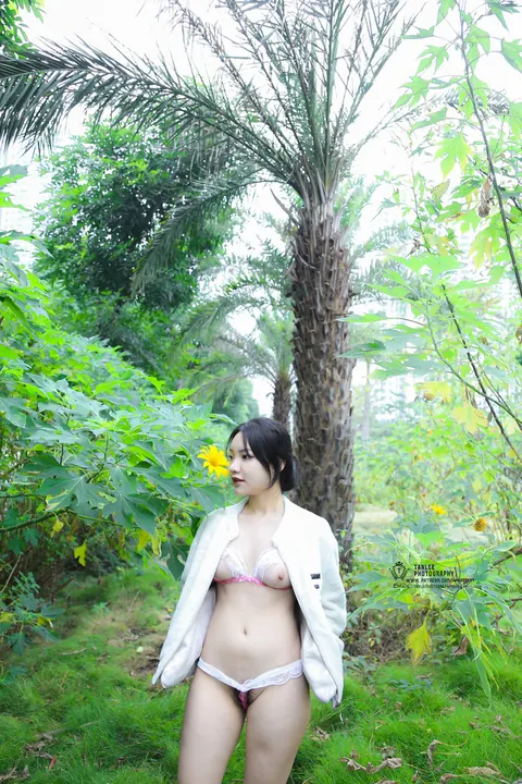 Asian Brunette with Short Hair Poses Outdoors in Revealing Clothes – photo 6 of 20
