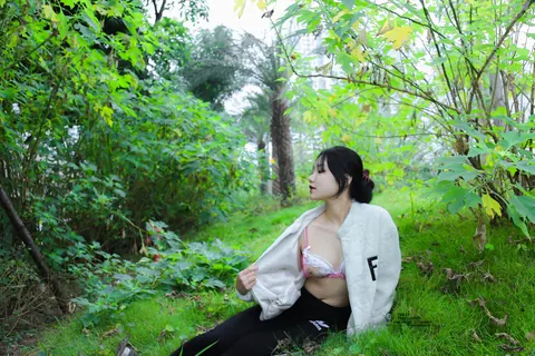 Asian Brunette with Short Hair Poses Outdoors in Revealing Clothes – photo 18 of 20