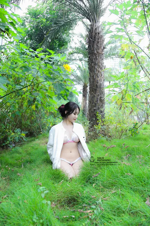 Asian Brunette with Short Hair Poses Outdoors in Revealing Clothes – photo 7 of 20