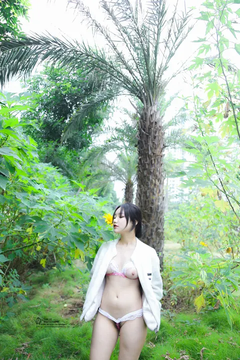 Asian Brunette with Short Hair Poses Outdoors in Revealing Clothes – photo 5 of 20