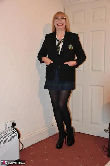 Curvy British MILF Peels Off Her Uniform and Rolls Down Her Hose