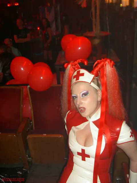 Joanne Lafontaine: Tall Busty Blonde Nurse Dominates in Latex and Stockings – photo 1 of 16