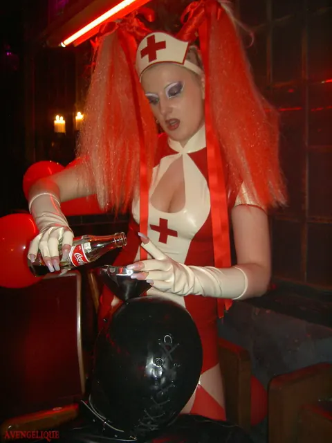Joanne Lafontaine: Tall Busty Blonde Nurse Dominates in Latex and Stockings – photo 11 of 16