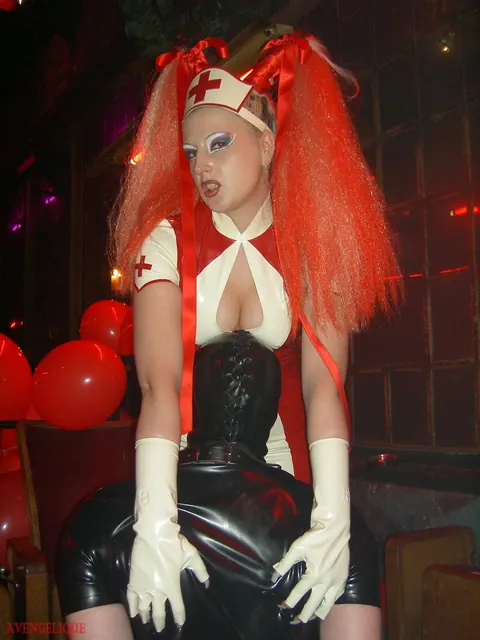 Joanne Lafontaine: Tall Busty Blonde Nurse Dominates in Latex and Stockings – photo 14 of 16