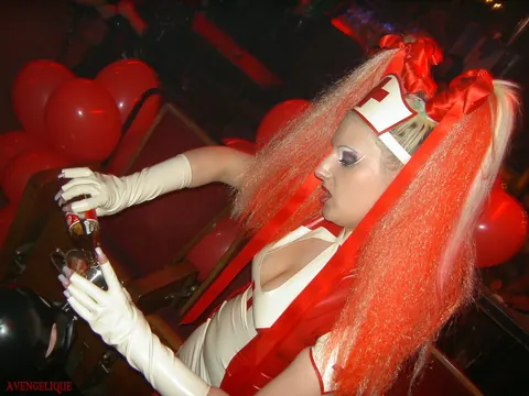Joanne Lafontaine: Tall Busty Blonde Nurse Dominates in Latex and Stockings – photo 12 of 16