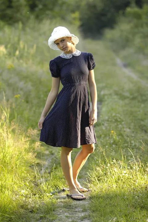 European Blonde Spreads Her Legs Outdoors in a Short Skirt – photo 1 of 21
