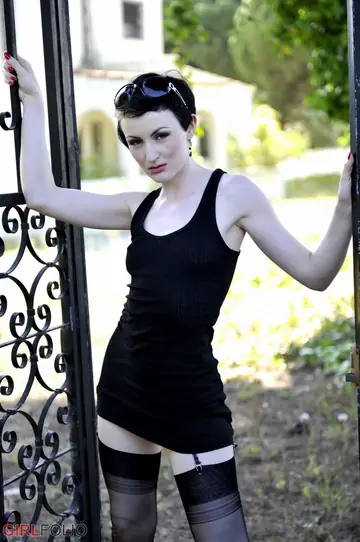 Anita De Bauch – Brunette with Short Hair Poses in a Skirt, Panties and High Heels