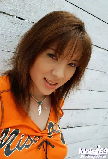 Asian Woman with Big Natural Tits Strips Out of Miniskirt Outdoors