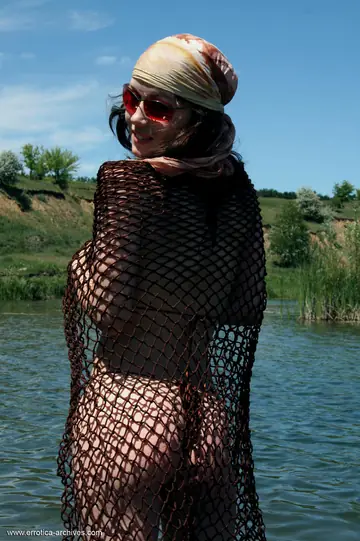 Thick Woman Reveals Her Big Tits from Bikini at the River