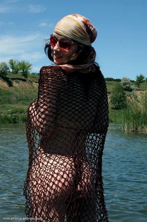 Thick Woman Reveals Her Big Tits from Bikini at the River – photo 1 of 16