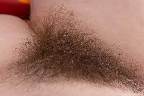 Busty Woman Undresses and Shows Her Hairy Pussy – photo 18 of 18
