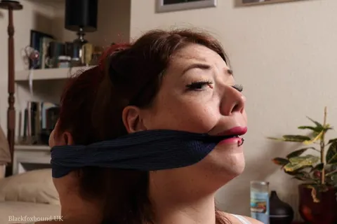 Curvy Redhead in a Skirt Gets Hogtied and Cleave-Gagged – photo 4 of 16
