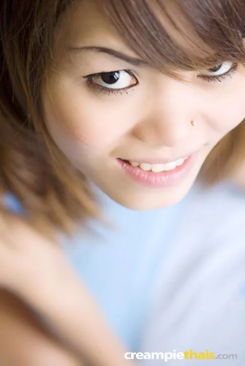 Thick Asian Brunette Reveals Her Trimmed Pussy on the Bed – photo 12 of 20