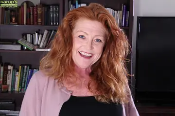 Mature European Redhead Strips Out of Her Jeans and Lingerie to Spread