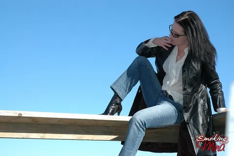 Brunette MILF in Leather and High Heels Smokes Outdoors – photo 11 of 16
