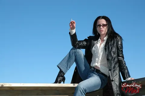 Brunette MILF in Leather and High Heels Smokes Outdoors – photo 12 of 16