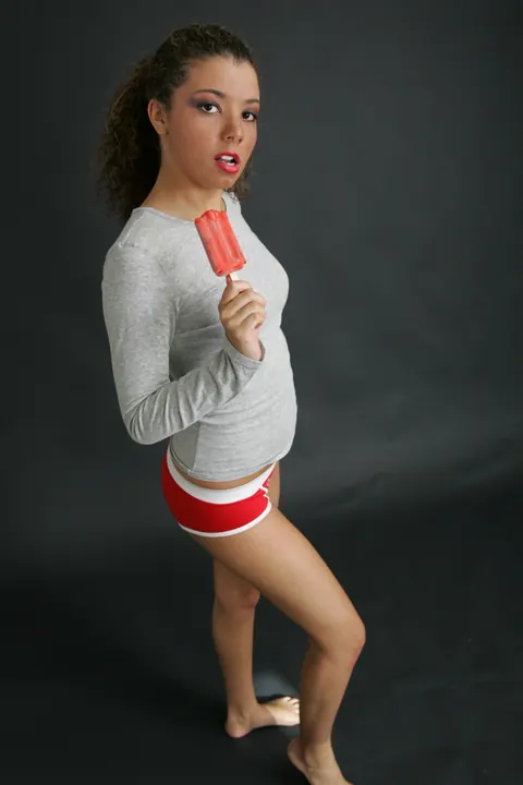 Brunette in Pigtails Shows Off Her Legs in Short Shorts – photo 16 of 21