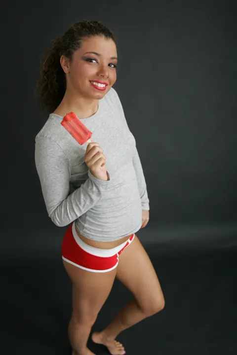 Brunette in Pigtails Shows Off Her Legs in Short Shorts – photo 13 of 21