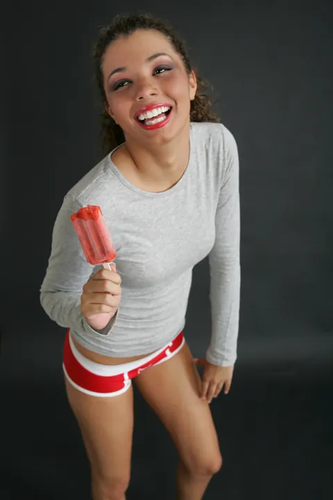 Brunette in Pigtails Shows Off Her Legs in Short Shorts – photo 8 of 21