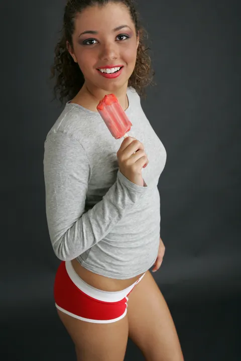 Brunette in Pigtails Shows Off Her Legs in Short Shorts – photo 4 of 21