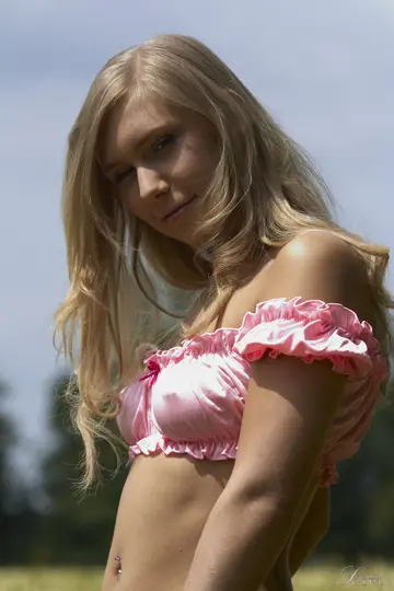 Blonde with Pierced Tits Spreads in the Forest