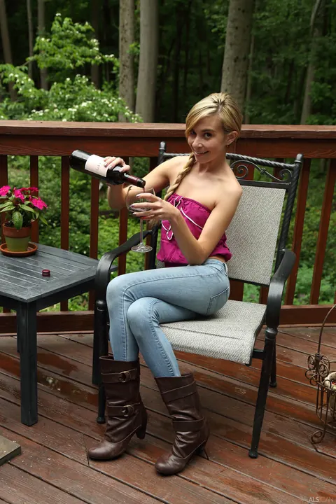 Kaylee Haze: Skinny Blonde in Pigtails Plays with a Toy Outdoors – photo 1 of 21