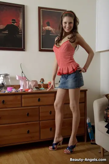 European Brunette Strips Naked and Toys Her Pussy with a Dildo
