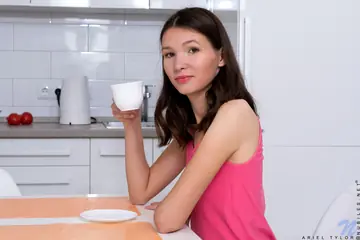 Slim Brunette with Natural Tits Spreads in the Kitchen