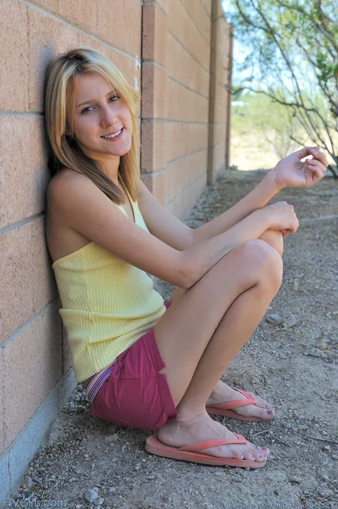 Woman Strips Outdoors and Toys Her Shaved Pussy – photo 2 of 20