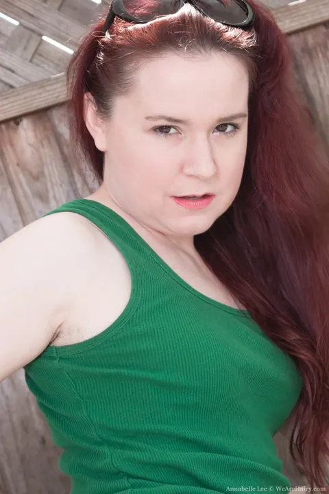 Annabelle Lee: Pale Redhead in Glasses Spreads Her Hairy Pussy on the Sofa – photo 3 of 21