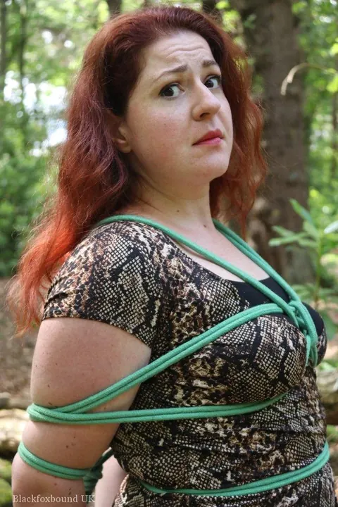 Redhead in a Skirt Hogtied in the Forest – photo 6 of 16