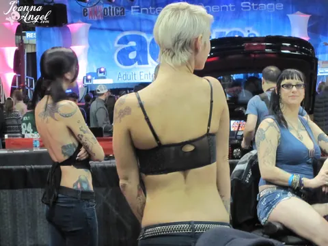 Joanna Angel: Busty Redhead and Friend Spread Their Legs at an Erotic Convention – photo 16 of 17