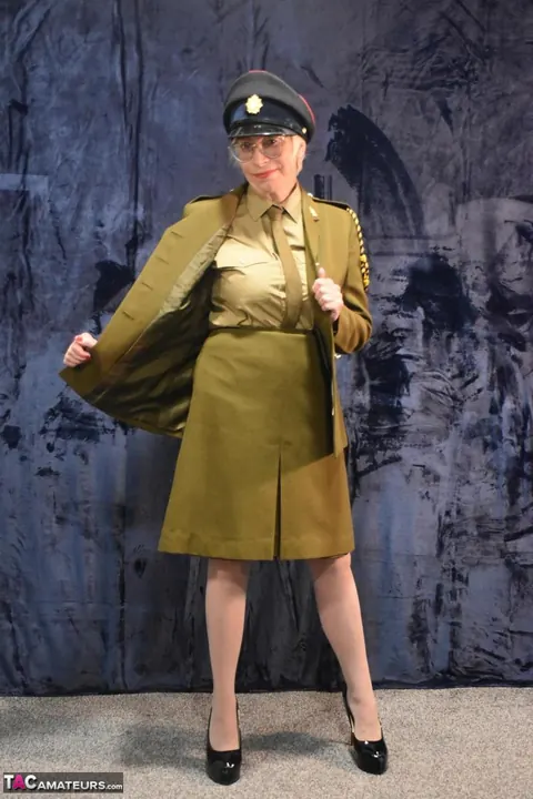 British MILF Strips Out of Her Military Uniform and Lingerie – photo 8 of 16