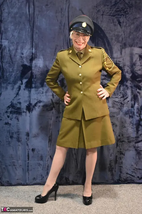 British MILF Strips Out of Her Military Uniform and Lingerie – photo 4 of 16