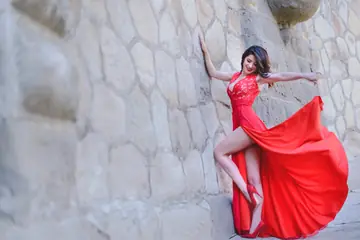 Brunette in High Heels Poses Outdoors