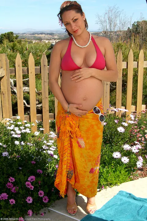 Pregnant MILF in a Bikini and Glasses Spreads Outdoors – photo 2 of 21