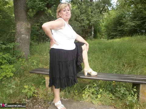 Thick MILF in Stockings Fingers Her Hairy Pussy on the Forest Bench – photo 14 of 20