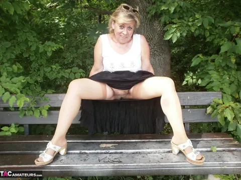 Thick MILF in Stockings Fingers Her Hairy Pussy on the Forest Bench – photo 10 of 20